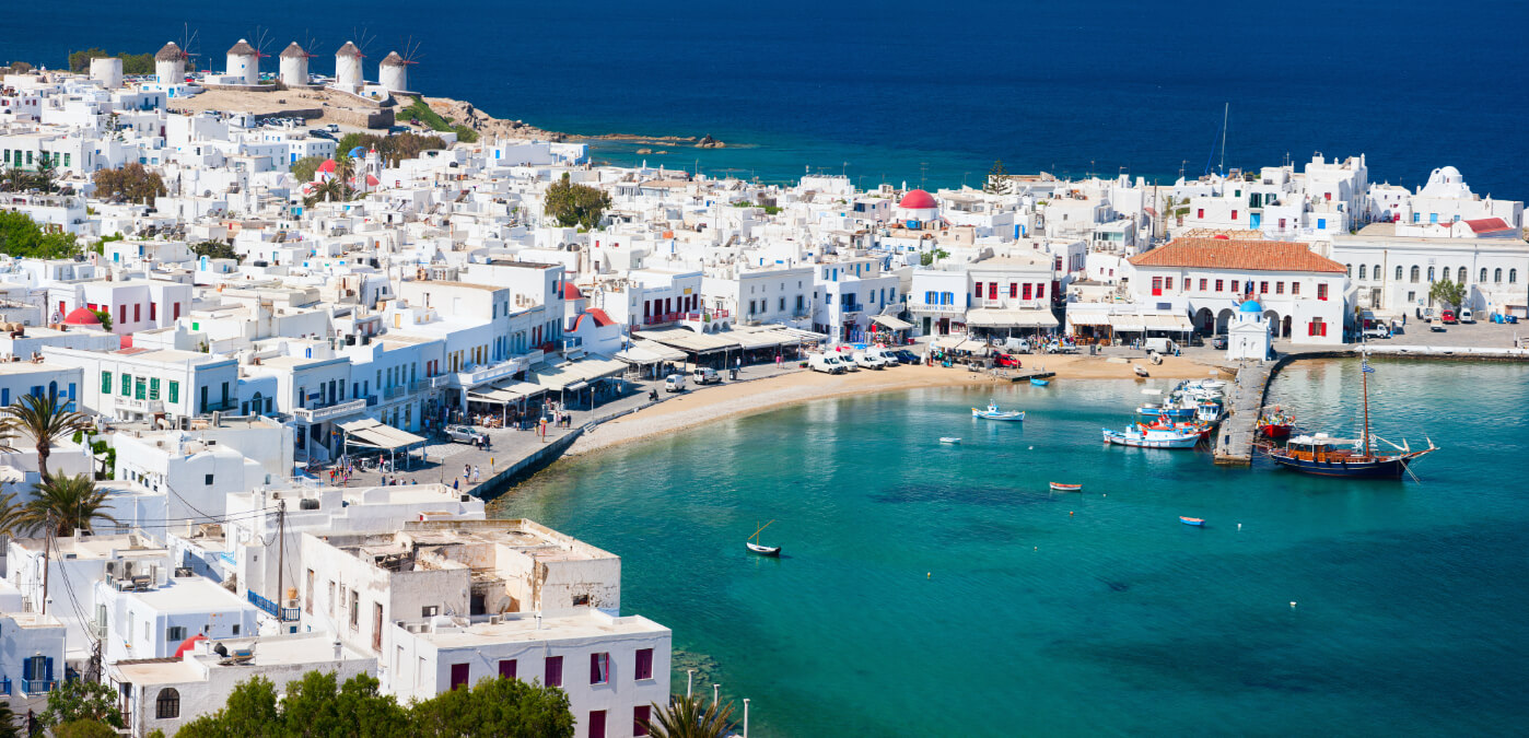 Panorama of traditional greek village with white houses on Mykonos Island