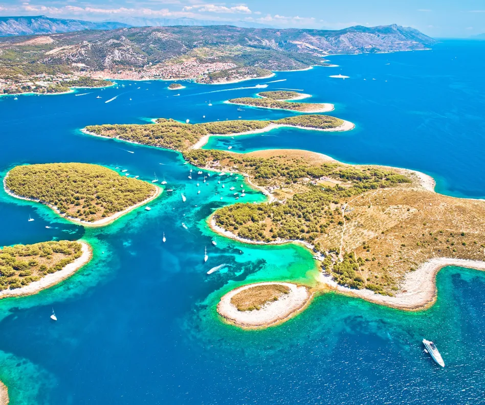 Immerse yourself in the turquoise waters of the Adriatic Sea, soak up the Mediterranean sun, and experience the magic of Croatia from the co
