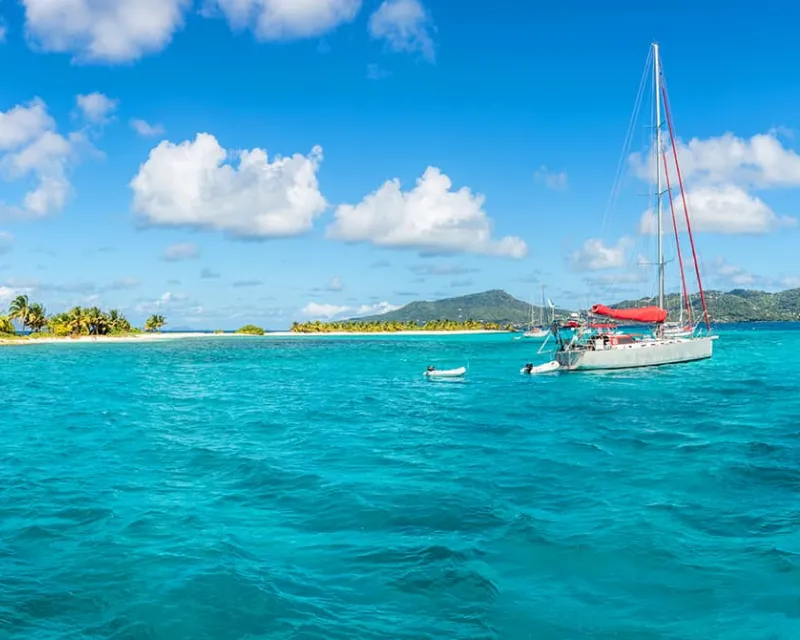 Turquoise-sea-and-anchored-yachts-near-Carriacou-island-Grenada