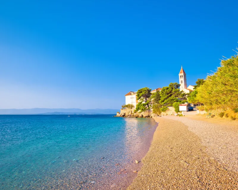 monastery on pebble beach in Bol island of Brac Dalmatia Croatia