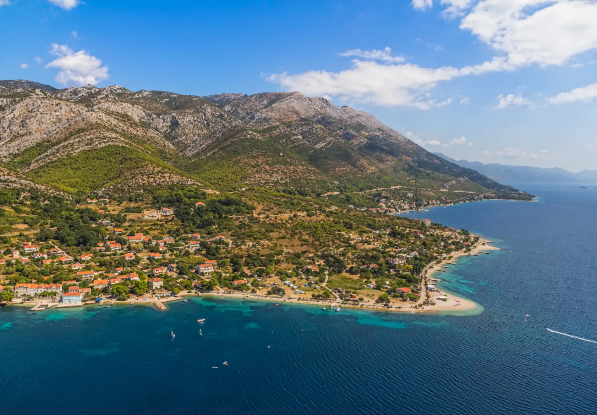 Helicopter aerial shoot of sandy beach Zrnovo near Orebic on Peljesac peninsula