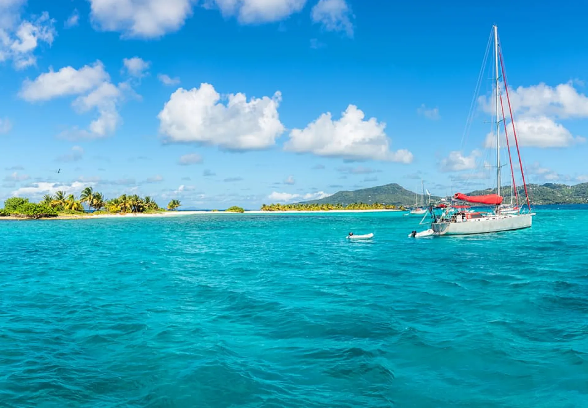 Turquoise-sea-and-anchored-yachts-near-Carriacou-island-Grenada