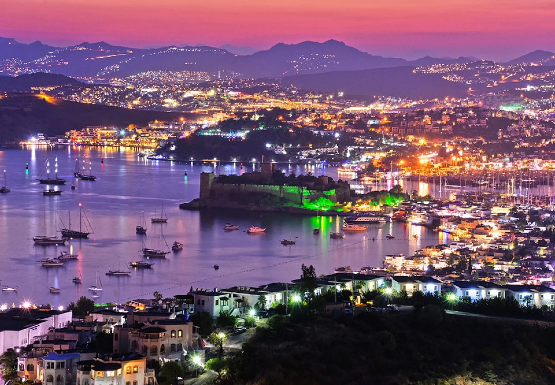 View-of-Bodrum-harbor-and-Castle-of-St.-Peter-by-night.-Turkish-Riviera