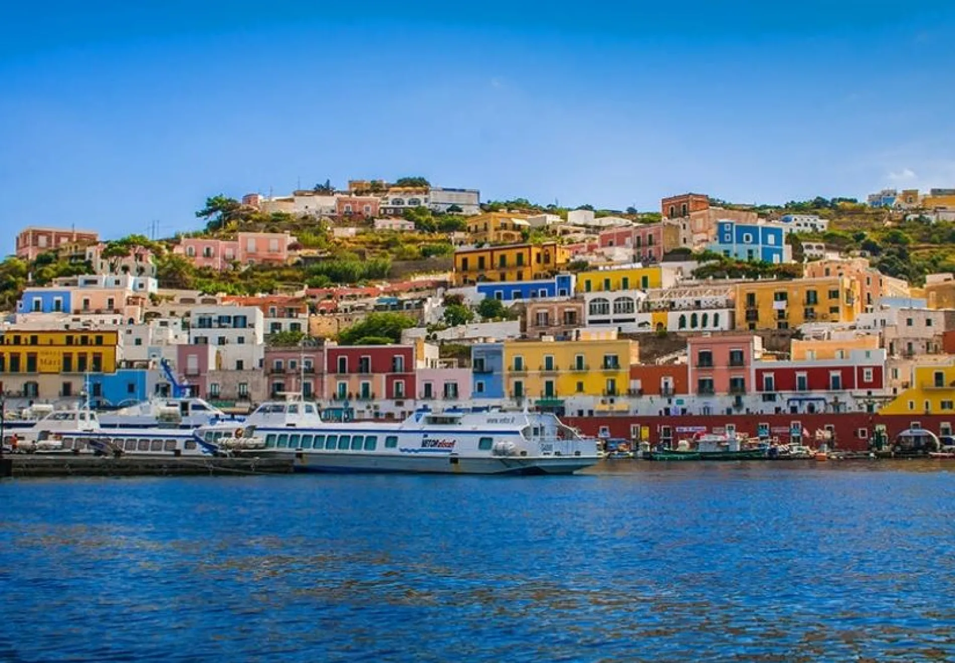 View-of-the-Main-Harbor-and-Port-at-Ponza-Italy.-Boats-at-sea-and-houses-on-the-mountainous-coastline CROP