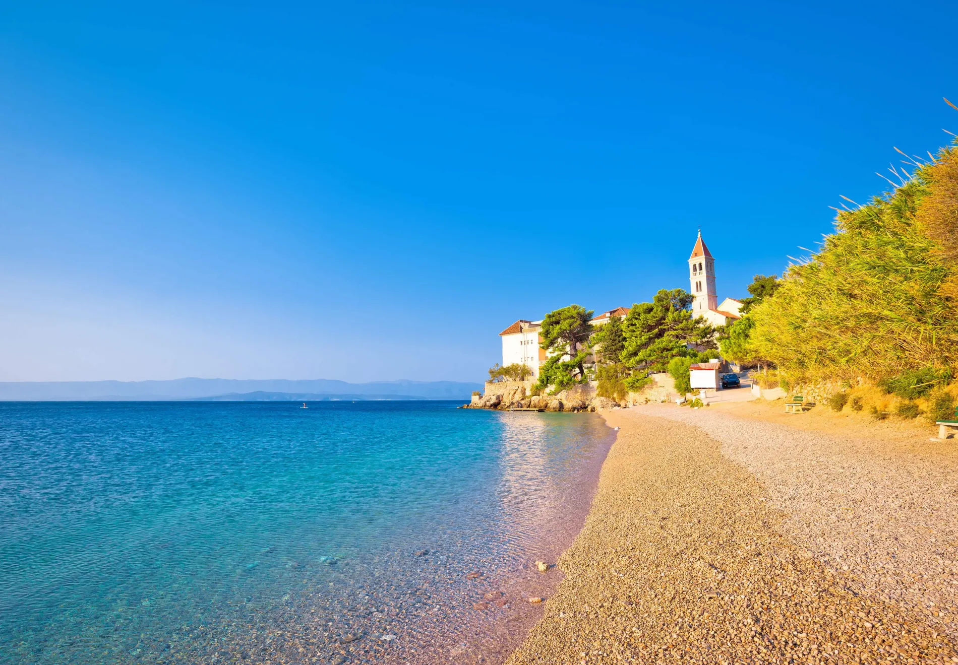 monastery on pebble beach in Bol island of Brac Dalmatia Croatia